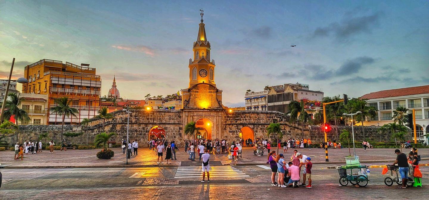 A picture of clock tower, Cartagena, surrounded by tourists